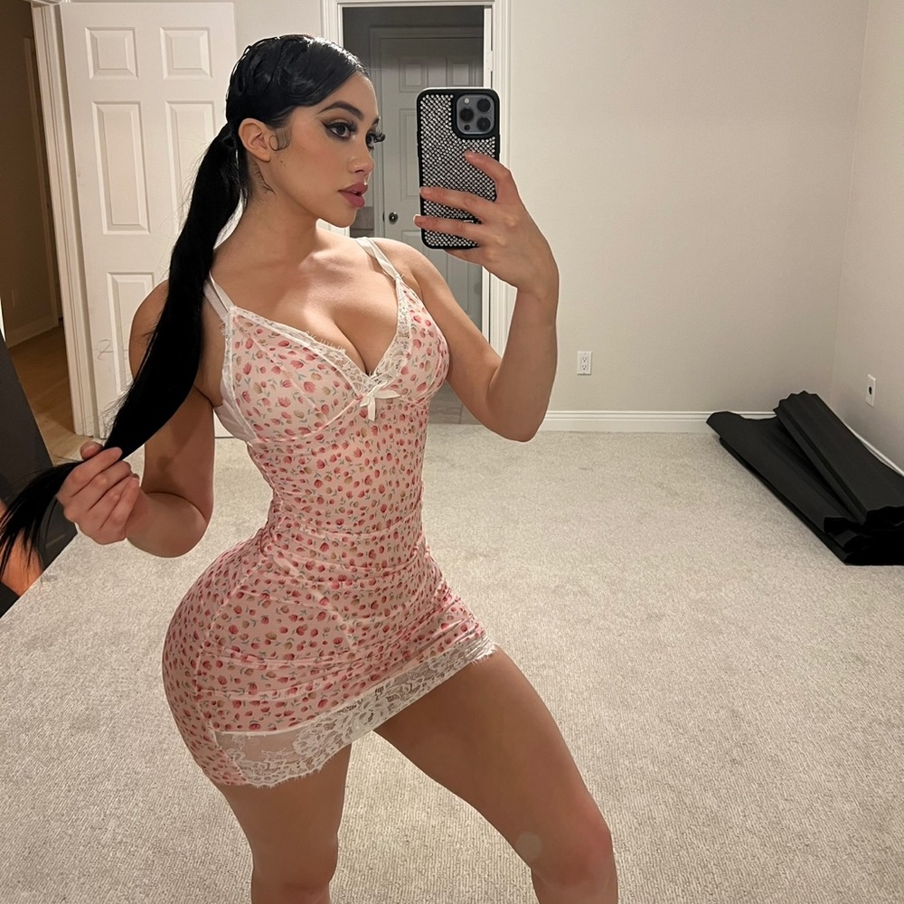 Floral see through dress and gray shorts and matching top